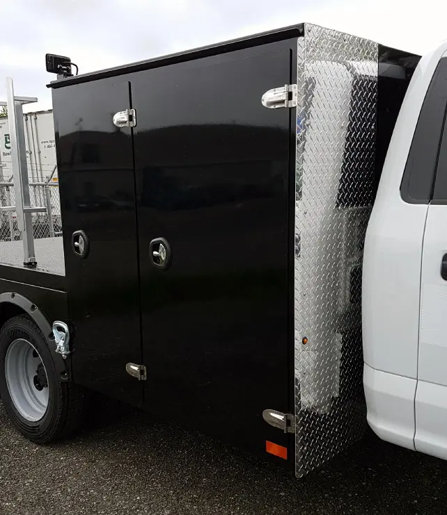 Wilcox Bodies Ltd. Black side body of custom Truck Body