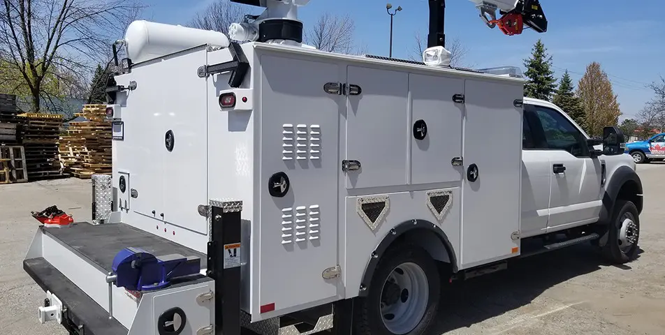 White Mechanics Truck Body with crane attachment and vertical and horizontal storage compartments