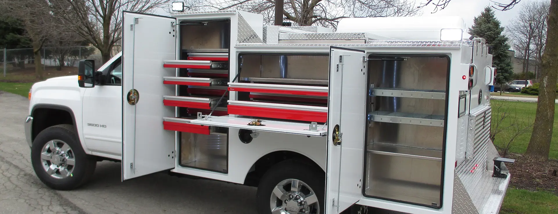 White Service Truck Body with custom sliding drawers in side compartments