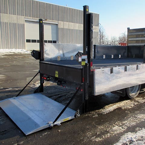 Flat Deck Truck Bodies with hydraulic liftgates and dropdown side rails