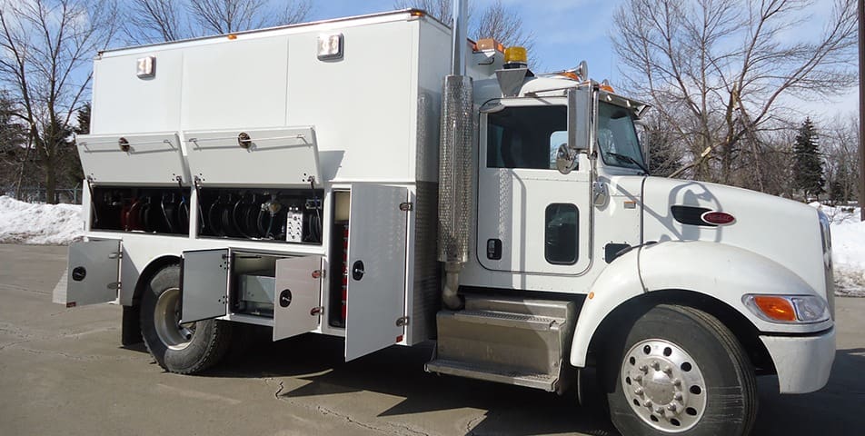 White Lube Truck Bodies with side panel storage compartments for tube reels